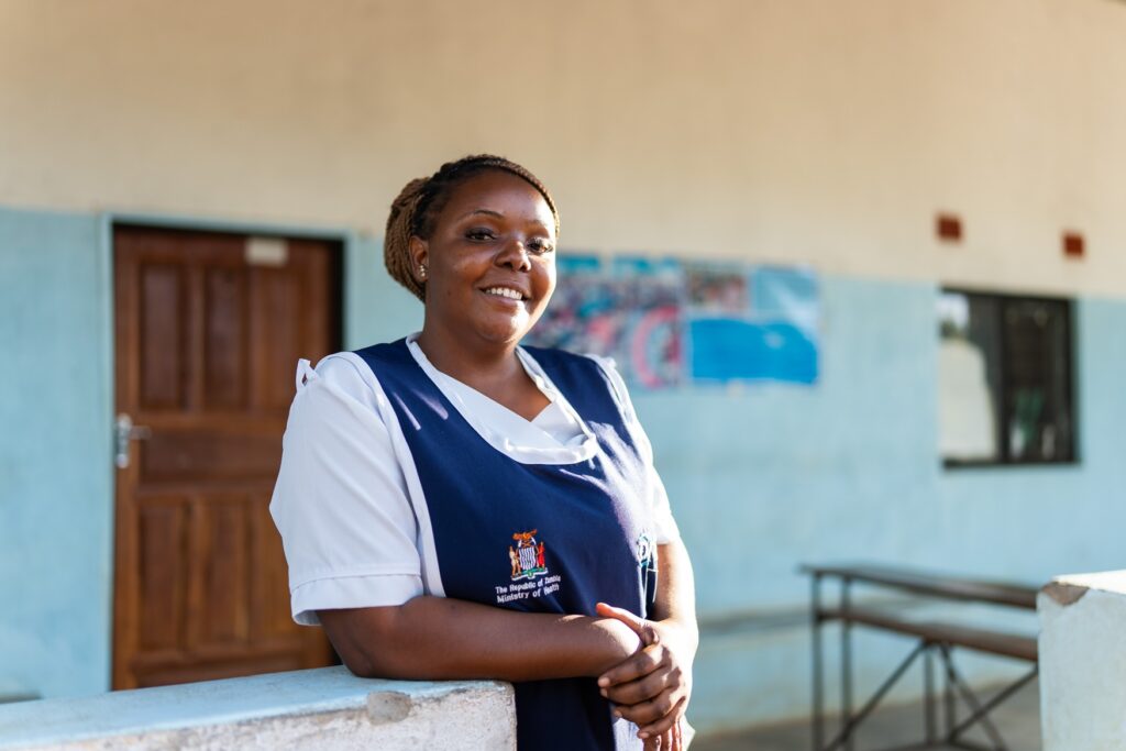 Cleopatra Maambo, a nurse at Ndubulula Health Post, poses for a picture at the facility in Kantyatya Village.